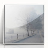 Winter-themed modern art wall decor on a framed acrylic, featuring a snowy landscape in muted white and gray tones.