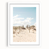 Abstract art print featuring swirls of blue and green on a white framed canvas, ideal for dining room decor.