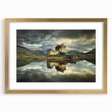 Gold-framed landscape artwork featuring a picturesque castle scene, elegantly matted for added depth, perfect for home decor and enhancing interior aesthetics.