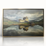 Framed acrylic wall art depicting a picturesque castle landscape, featuring golden accents and a sleek design, ideal for home decor and elegant spaces.