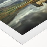 Beautiful rolled canvas artwork depicting a picturesque landscape with a majestic castle surrounded by lush greenery and serene skies, perfect for home decor.