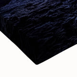 Close-up of a stretched canvas artwork showcasing a vibrant landscape of abstract caves, featuring rich colors and intricate textures, ideal for modern home decor.