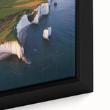 Close-up of a framed canvas artwork showcasing dramatic cliffs in a vibrant landscape, highlighting rich colors and intricate textures, perfect for home decor.