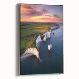 Framed canvas artwork depicting a breathtaking landscape with dramatic cliffs, enhanced by a sleek silver frame, perfect for elevating home decor.