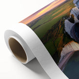 Stunning rolled canvas print showcasing a dramatic cliffside landscape with vibrant colors, perfect for adding a natural touch to home decor.