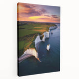 Stretched canvas artwork depicting dramatic cliffs and landscapes in vibrant colors, showcasing natural beauty and depth, ideal for home decor or office spaces.