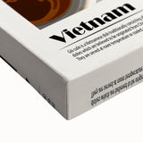 Large art of a black and white landscape painting on stretched canvas, featuring silhouetted food dishes.