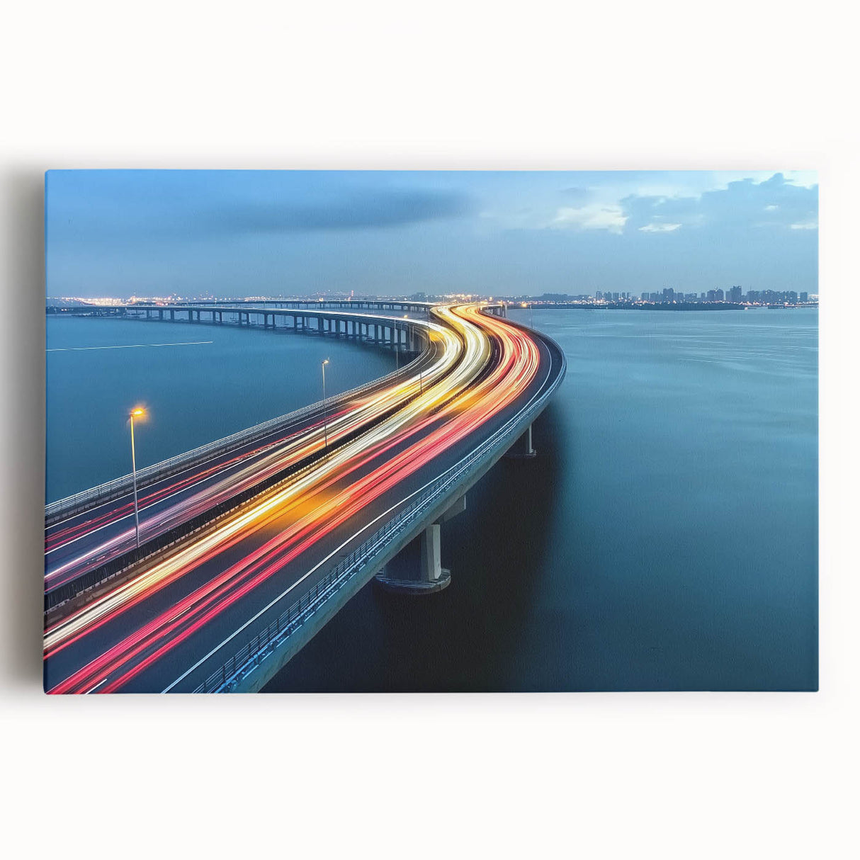 Stretched canvas artwork of a serene landscape featuring a picturesque bridge over a tranquil river, surrounded by lush greenery and vibrant flowers, perfect for home decor.