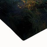 Close-up of a stretched canvas depicting a serene countryside landscape with vibrant greens and blues, showcasing rolling hills and a clear sky, perfect for home decor.