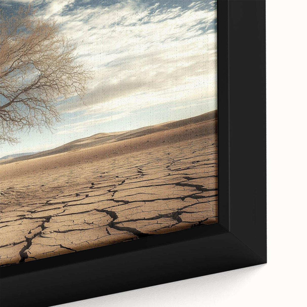 Close-up of a framed canvas showcasing a vibrant desert landscape, featuring warm hues of orange and yellow with intricate details of cacti and mountains, ideal for home decor.