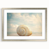 Textured art print of abstract nature elements in silver frame, using earthy tones, ideal for bedroom decor.