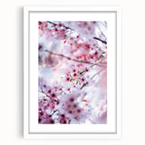 Abstract art print featuring swirling spring hues on a white framed mat, ideal for dining room decor.