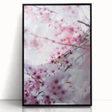 Large abstract wall art depicting spring themes in bright green and yellow tones on a black framed acrylic print.