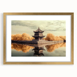 Luxurious gold-framed landscape artwork showcasing a majestic castle scene with lush greenery in the foreground, perfect for enhancing home decor aesthetics.