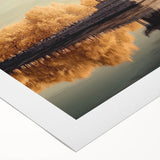 Rolled canvas artwork depicting a scenic landscape with a majestic castle, showcasing vibrant colors and intricate details, elegantly packaged for easy display.