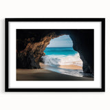 Framed landscape artwork depicting a serene cave scene, featuring a black mat and elegant frame, perfect for enhancing home decor with nature-inspired aesthetics.