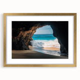 Elegant gold-framed landscape artwork depicting a serene cave scene with a mat, perfect for home decor. Ideal for enhancing living spaces with nature-inspired art.