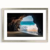 Silver-framed landscape art print featuring a serene cave scene, elegantly matted for a polished presentation, ideal for home decor and interior design enthusiasts.