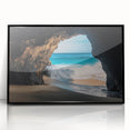 Framed acrylic artwork showcasing a serene landscape scene featuring caves, presented in a sleek black frame, perfect for modern home decor.