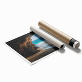 Rolled print showcasing a vibrant landscape scene with intricate cave details, designed for artistic decor; packaged securely in a protective tube.
