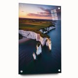 Acrylic artwork depicting a dramatic cliff landscape, showcasing vibrant colors and intricate details, presented in a sleek glass frame with decorative pins. Perfect for modern home decor.