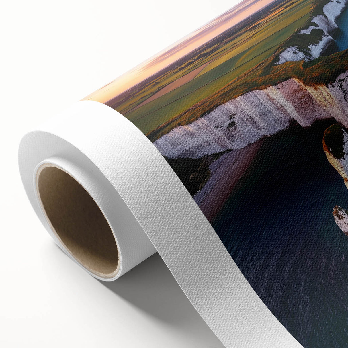 Stunning rolled canvas artwork depicting dramatic cliffs against a vibrant sunset, showcasing rich colors and textures, perfect for enhancing modern decor.