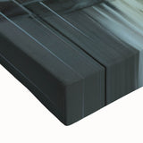 Close-up of a stretched canvas featuring an abstract architectural design, showcasing intricate geometric patterns in vibrant colors, ideal for modern home decor.