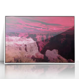 Framed acrylic artwork showcasing a vibrant landscape of canyons in rich earth tones, set in a sleek white frame, ideal for home decor and artistic expression.