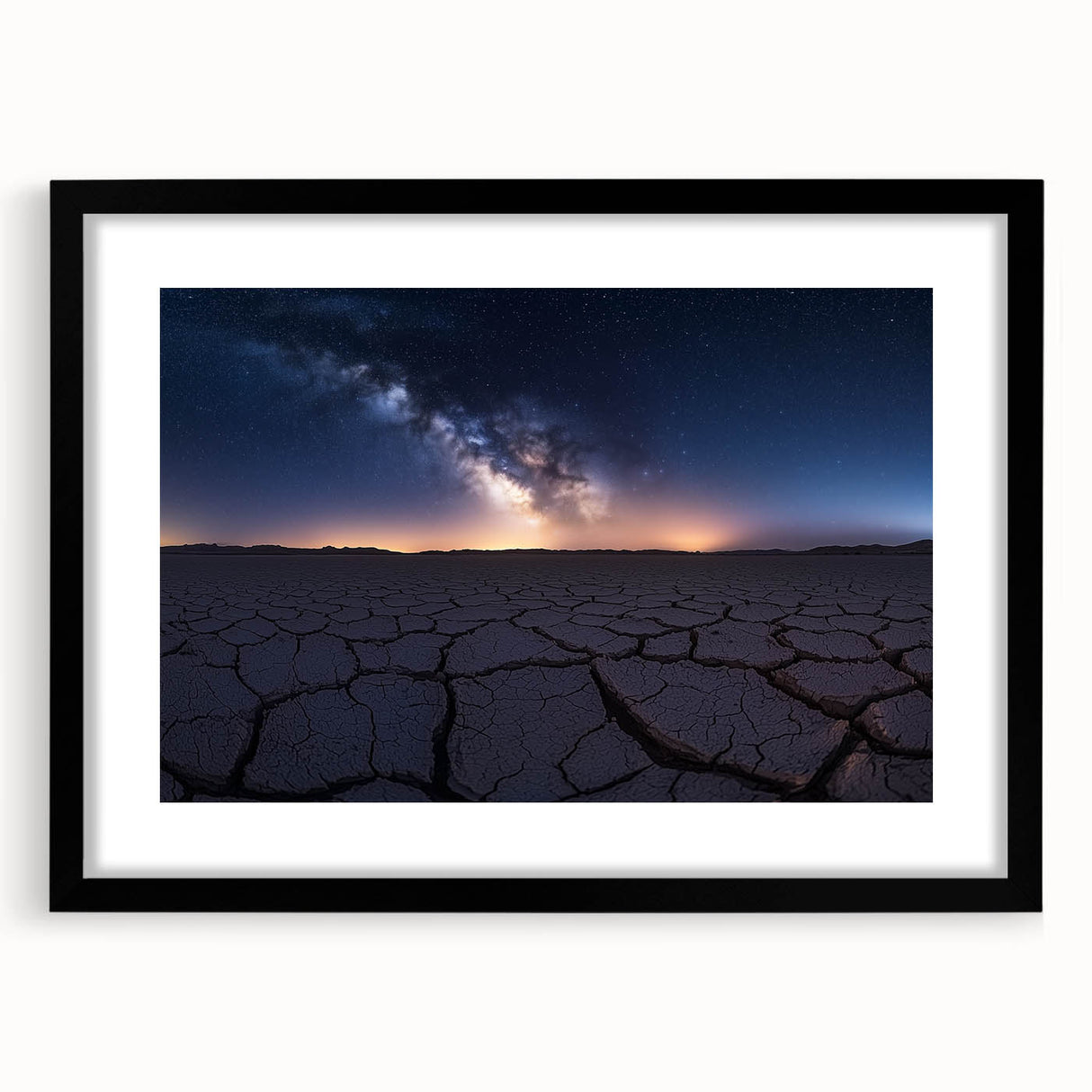 Black-framed desert landscape artwork with a white mat, showcasing vibrant colors and intricate details, perfect for enhancing modern home decor.