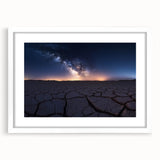 Desert landscape framed art print with a white mat, showcasing vibrant hues of orange, yellow, and blue, ideal for modern home decor or office settings.