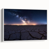 Framed canvas artwork depicting a serene desert landscape with soft beige and orange hues, showcased from a side view against a white backdrop, perfect for home decor.