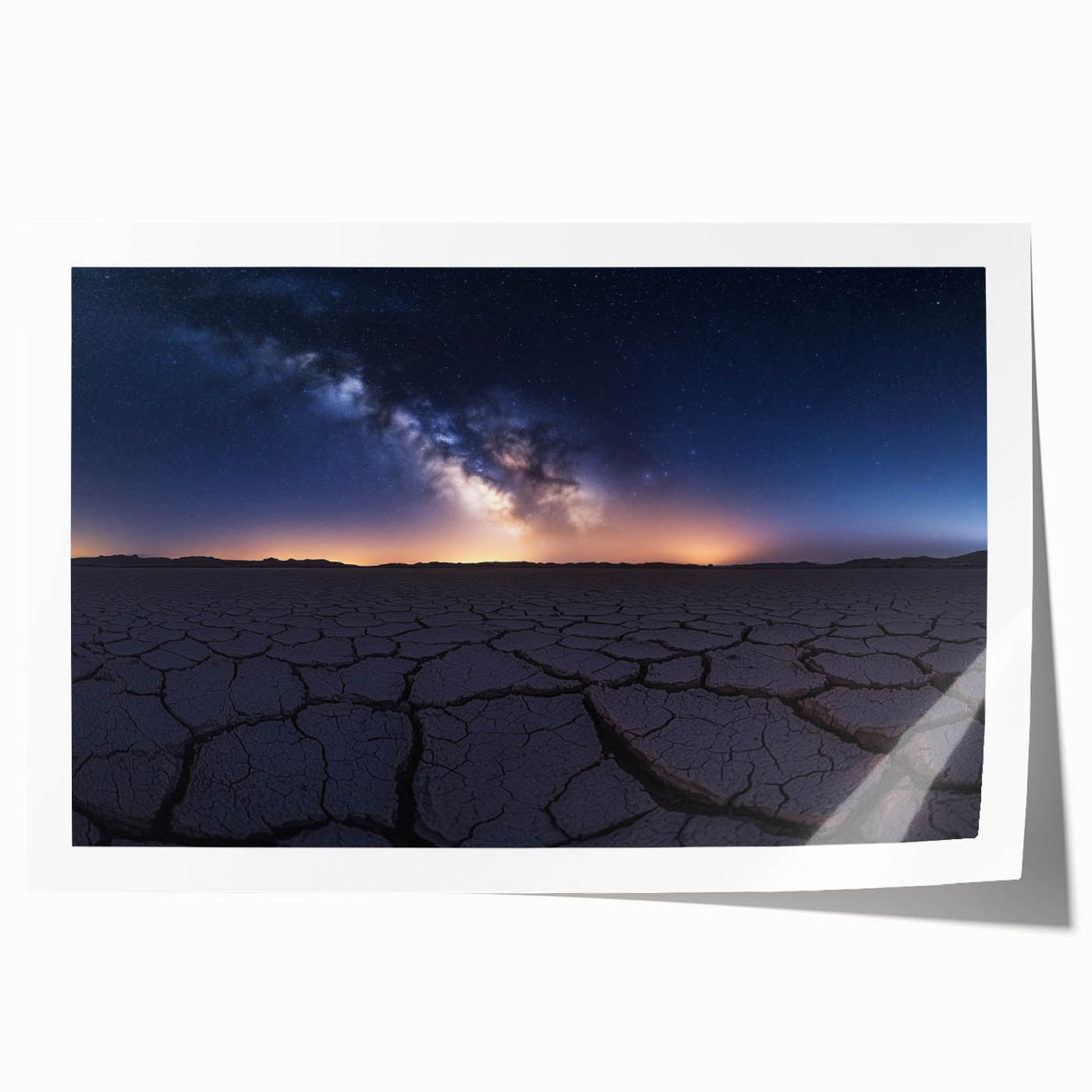 Desert landscape rolled canvas print showcasing warm hues of orange and yellow, with intricate details of dunes and a clear blue sky, ideal for home decor.