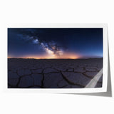 Desert landscape rolled canvas print showcasing warm hues of orange and yellow, with intricate details of dunes and a clear blue sky, ideal for home decor.