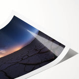 Desert landscape rolled canvas print showcasing warm tones of orange and brown, highlighting textured sands and distant mountains, packaged for art lovers.