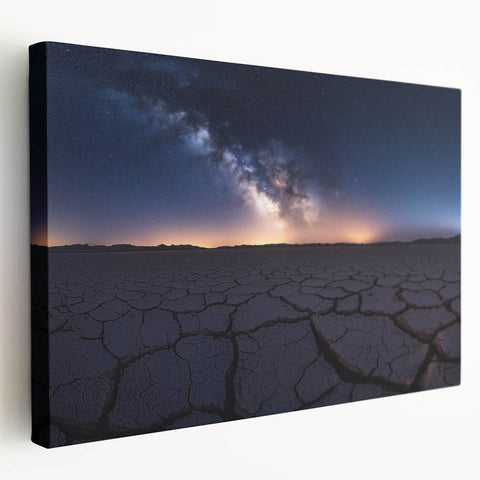 Desert landscape stretched canvas artwork showcasing vibrant hues of orange and yellow, depicting a serene sunset over sand dunes, perfect for home decor.