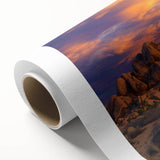 Vibrant rolled canvas showcasing a serene landscape with rolling green fields and a bright blue sky, elegantly packaged in a protective cardboard tube for easy transport. Perfect for nature-themed decor.