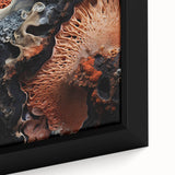 Close-up of textured black wall art with colorful abstract elements on a large framed canvas, suitable for living room decor.