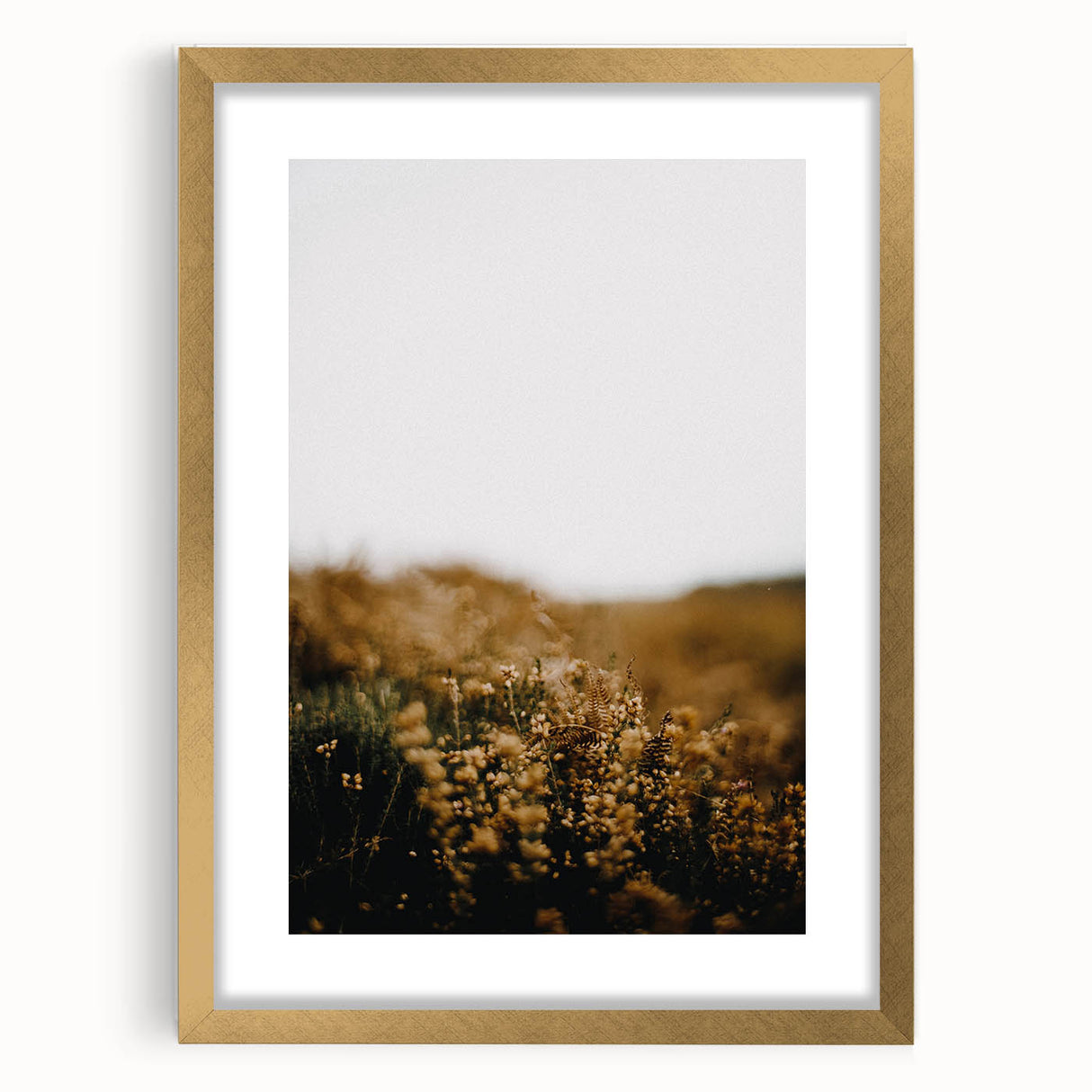 Extra large abstract art print featuring textured autumnal hues in a gold frame, ideal for living room decor.