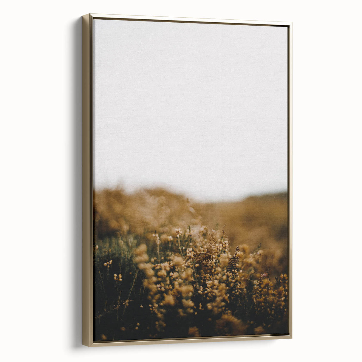 Framed canvas featuring a vintage-style landscape painting of autumn trees with gold and black tones.