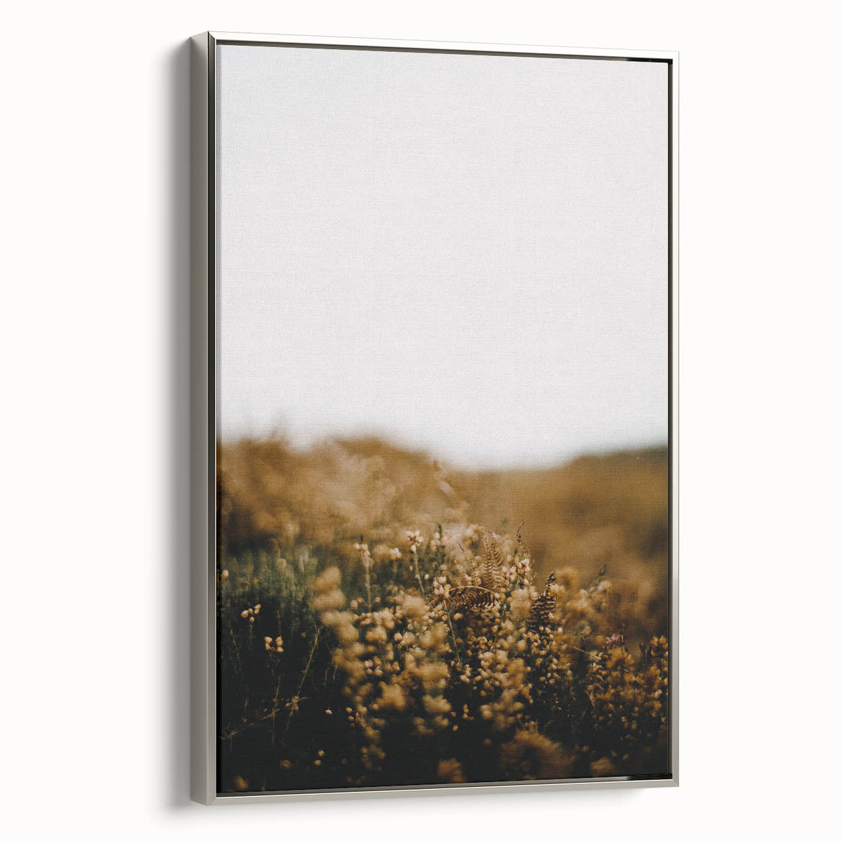 Framed canvas depicting a vintage-style landscape art painting with colorful autumn trees and a black background.