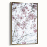 Framed canvas depicting a vintage landscape with spring theme, in muted gold and black, ideal for bedroom wall art.
