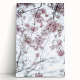 Black and white abstract print on stretched canvas featuring swirling patterns.