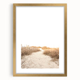 Extra large abstract art print featuring textured swirls in warm orange and gold tones, framed in gold.