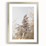 Textured abstract art print in muted earth tones on a framed canvas, suitable for bedroom decor.