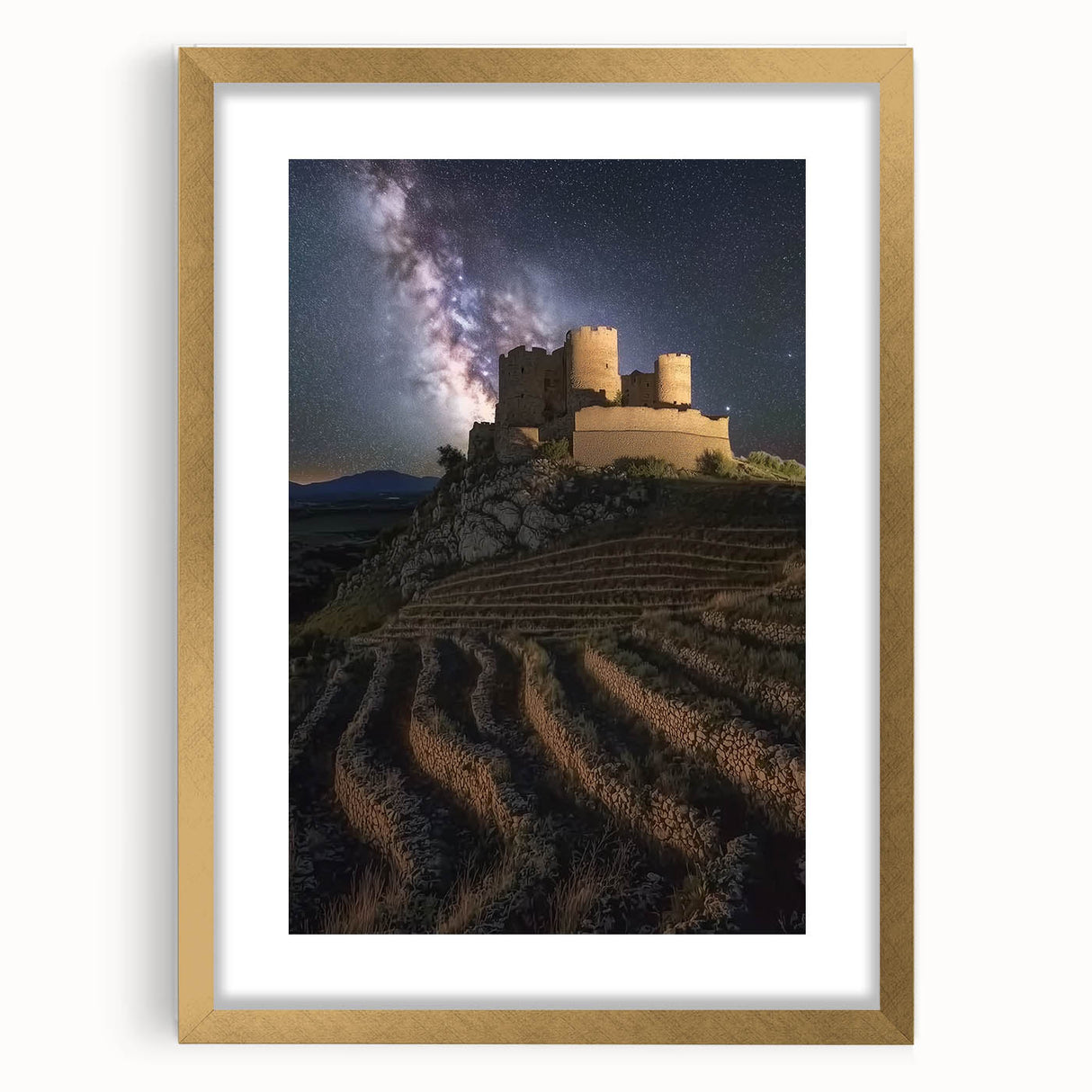 Elegant gold-framed landscape artwork depicting a serene castle scene, complete with a white mat that enhances its luxurious appeal, ideal for home decor.
