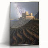 Framed acrylic artwork showcasing a picturesque landscape with a majestic castle, elegantly displayed in a silver frame, enhancing its visual appeal and sophistication.