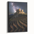 Framed canvas artwork showcasing a stunning landscape with a medieval castle, featuring a black frame and side view, ideal for home decor and enhancing interior aesthetics.