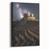 Framed canvas artwork showcasing a stunning landscape with a medieval castle, featuring a black frame and side view, ideal for home decor and enhancing interior aesthetics.