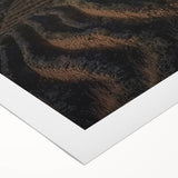 Rolled canvas artwork showcasing a picturesque landscape with a majestic castle surrounded by lush greenery, presented in a durable cardboard tube for safe storage.