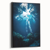 Framed canvas wall art depicting a serene landscape scene with caves, featuring a black side view. Ideal for modern home decor, enhancing interior aesthetics.